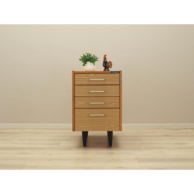 The chest of drawers was made in the 1970s, produced by the well-known Danish manufactory Sorø Terminalborde. The...