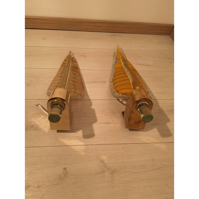 Large Wall Lights in Brass and Murano Glass, 1990s, Set of 2, in Very Good conditions. Designed 1990 to 1999 Up to 250V...