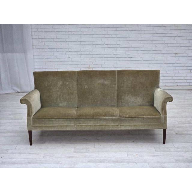 1960s, Danish 3-seater sofa. Original light green furniture velour, ash wood legs, brass springs in the seat. Original...
