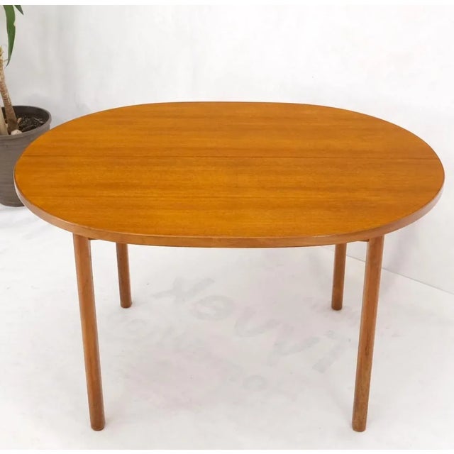 Wood Compact Teak Danish Mid-Century Modern Dining Table w/ Large Leaves Extensions For Sale - Image 7 of 13