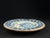 Rare 17th-century Catalan blue and white tin-glazed earthenware plate, produced in Catalonia, Spain. The plate features a...
