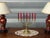 Beautiful 7-branch candelabra made entirely of gilded brass. 11 cm hexagonal base with delicate hand-crafted motifs....