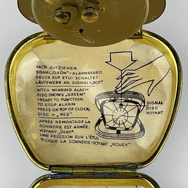 Vintage travel alarm clock by Schatz made in Germany in the 1970s. The manual winding movement. The lid folds, allowing...