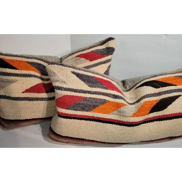 These hand woven weaving bolster pillows. Colorful Stripes and chevrons in the front with a linen backings. The inserts...