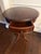 Add classic elegance to your entryway, living room, or study with this vintage Regency-style mahogany pedestal drum table....