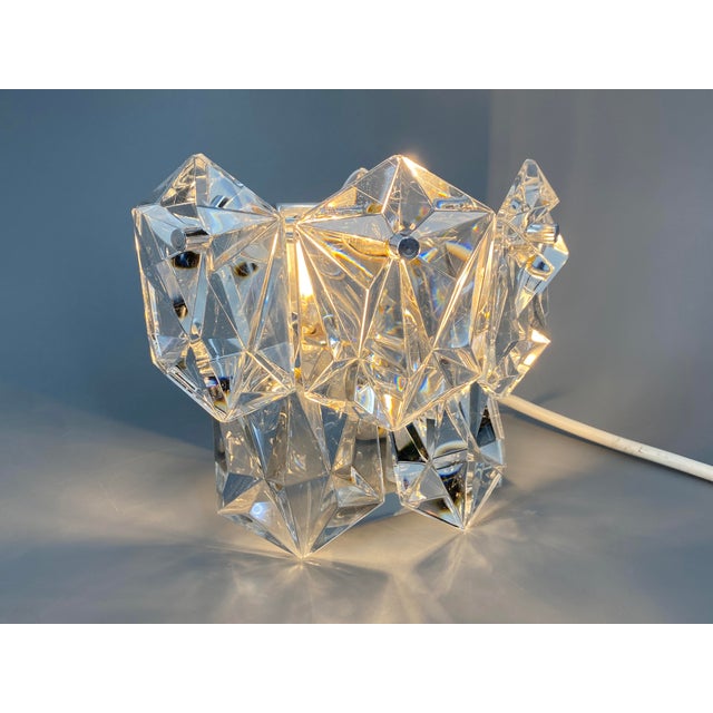 A pair of wall lamps * by kinkeldey lighting * 5 faceted crystal glass elements * chrome finish * each with one e14 socket...