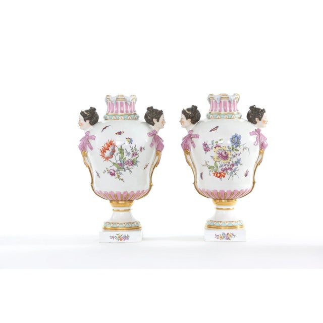 Mid-19th century large pair of " KPM " German gold gilt with floral details porcelain decorative urns / vases. Each one is...