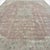 This elegant antique Turkish Gördes rug is an impressive large-scale piece with a beautifully softened palette. The muted...