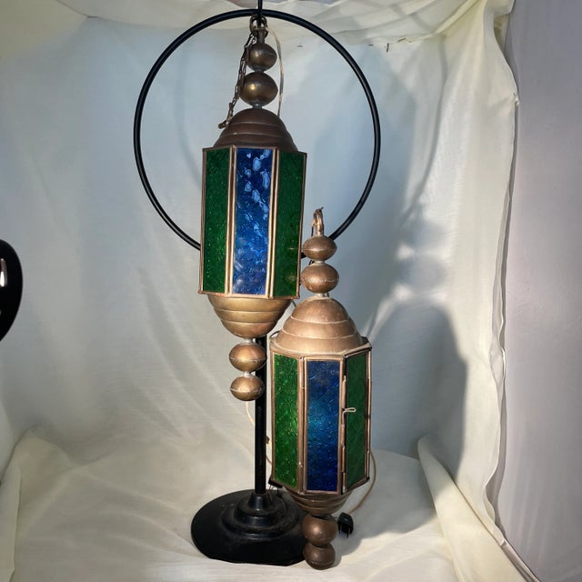 This is an unusual pair of working stained glass pendants from a church in Michigan. Blue and green panels of etched glass...