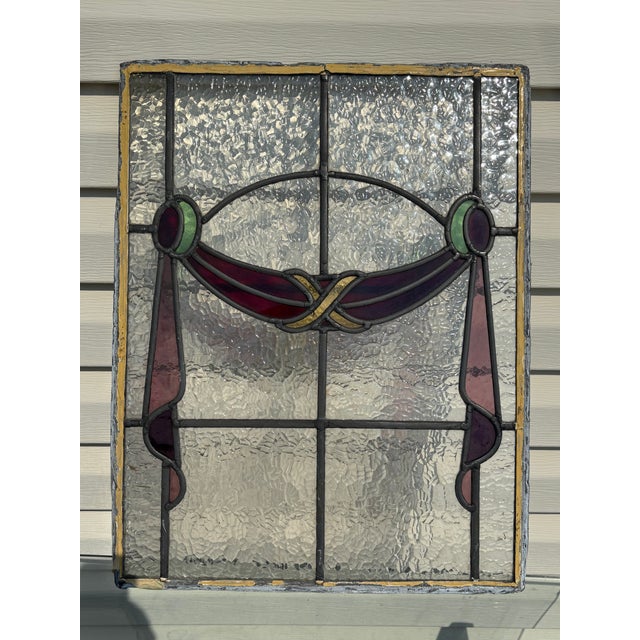 Nicely executed and colorful Late 19th / Early 20th Century. Stained Glass Window. Showing a coordinated mix of colors -...