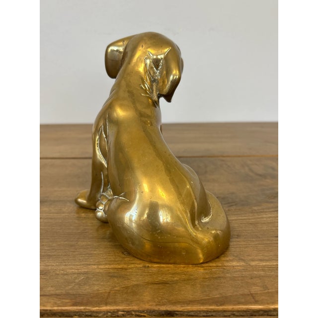 A charming vintage English brass dog figure, full of warmth and character. The casting shows lovely detail, from the...