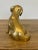 A charming vintage English brass dog figure, full of warmth and character. The casting shows lovely detail, from the...