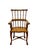 English Windsor Armchair, Circa 1870. This English Windsor armchair, circa 1870, is made of oak and features a comb-shaped...