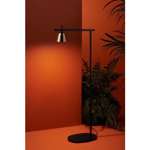 Lighto p floor lamp. Structure in black matt lacquered steel. Dome in golden glossy or black chrome electroplated. Base in...