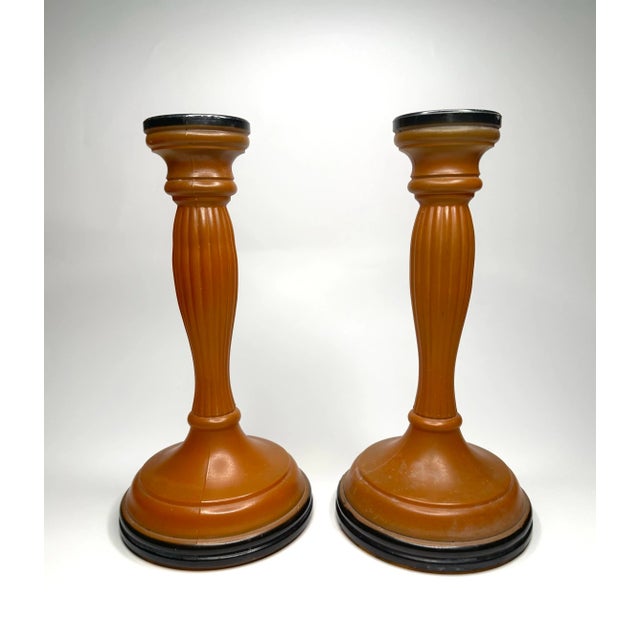 A unique color combo of orange and black adorns this pair of Art Deco style glass candlesticks. The Czechoslovakian glass...