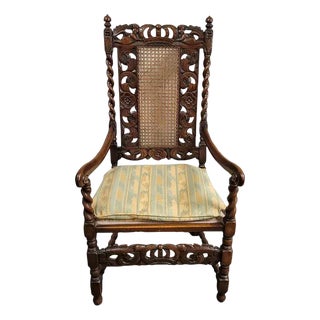 Antique Italian Renaissance Revival Carved Walnut Throne Hall Chair With Putti, Cane Back & Barley Twist Arms For Sale