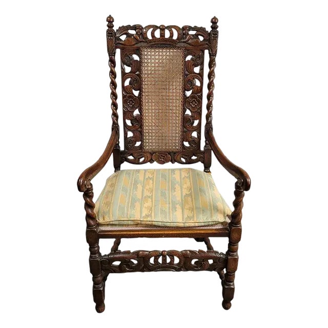 Antique Italian Renaissance Revival Carved Walnut Throne Hall Chair With Putti, Cane Back & Barley Twist Arms For Sale