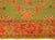 An early 20th Century Turkish Oushak Rug featuring a bright green field