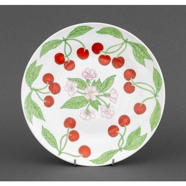 Richard Ginori Cherry Motif Porcelain Partial Dinner Service Set, comprising: five two handled soup bowls, 11 bread and...