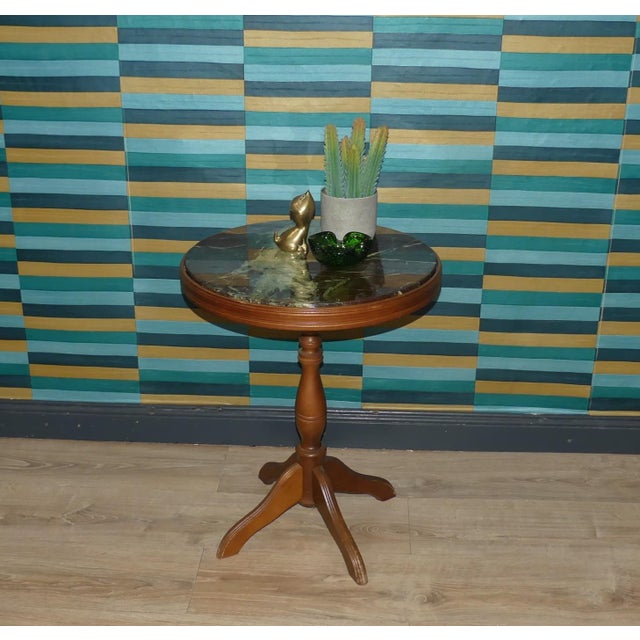 Classic Side Table Charming coffee/side table with elegantly curved legs in the Chippendale style Round tabletop with...