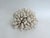 This large natural Cluster Coral has a unique organic texture and this piece displays well from all sides. It has a cut...