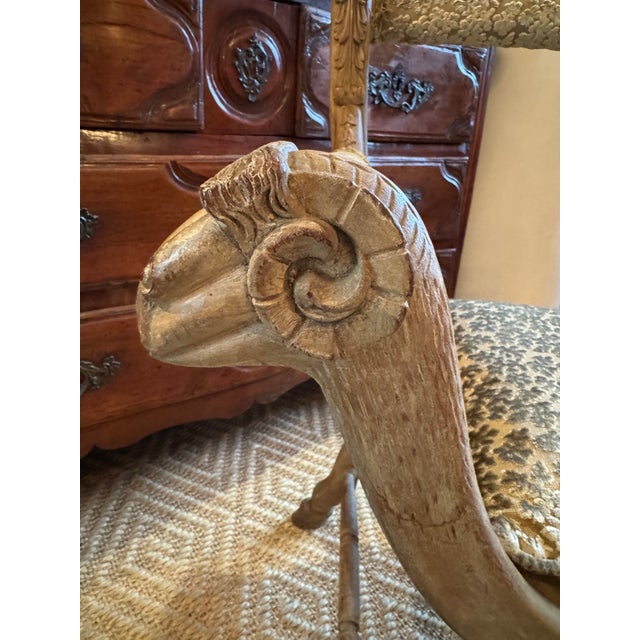 Antique Neoclassical Curule Chair with Rams Head Armrests and Carved Hairy Paw Feet. CERUSED finish with soft patina....