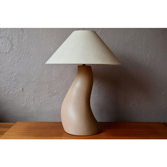 This 1970s lamp, designed by Jacques Molin for Charolles, is a beautiful piece that elegantly captures the creative spirit...