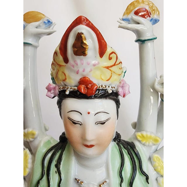 Chinese 1000 hands statue represents Guanyin (Avalokiteśvara), the bodhisattva of compassion, and symbolizes an infinite...