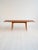 Table with teak top and oak legs, extendable on both sides. Danish production, 1960s. A Danish dining table from the...
