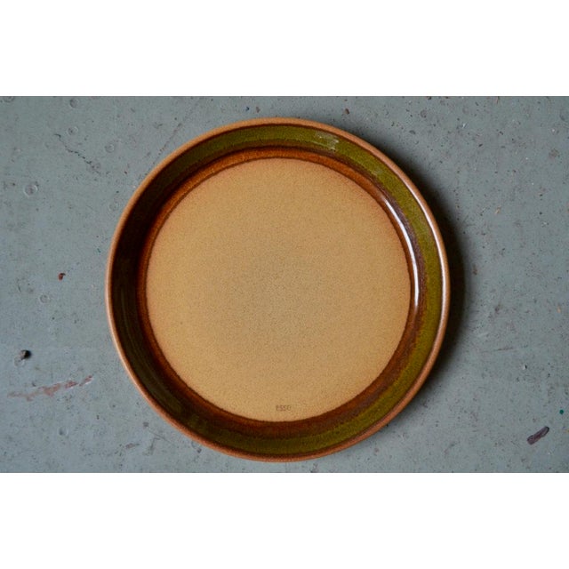 Distributed in gas stations as promotional gifts, these pretty stoneware plates have a vintage charm. The raw, country...