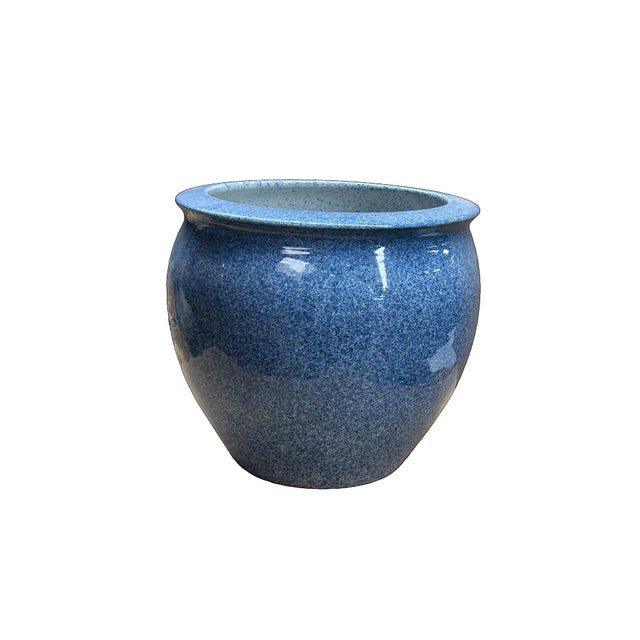 This vintage-style ceramic planter features a bulbous, rounded body with a gracefully flared rim, finished in a striking...