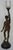 Hermès carries his lighted torch in this spelter metal lamp from the late 19th century. The statue has a satin frost...