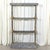 A masterful fusion of rustic industrial strength and Old World refinement, this bespoke French artist’s shelf or étagère...