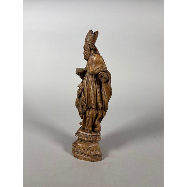 Saint Bishop, Italian work from the late 17th century, wood sculpture with a light patina, height 26 cm