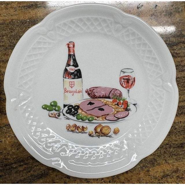 A delightful set of six French porcelain dessert plates by Philippe Deshoulières, Edition Louiroux, France. Each plate...