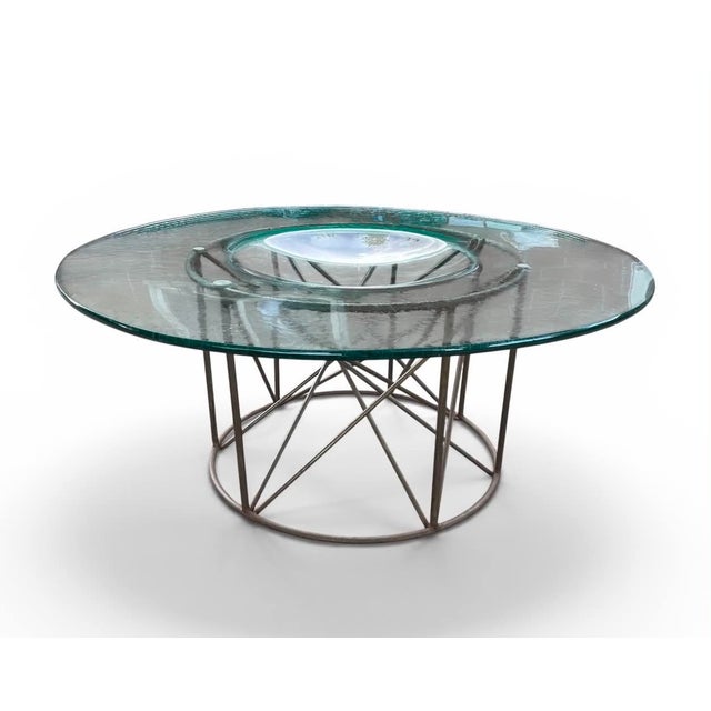 Sculptural metal coffee table with concave glass top, probably American, circa 1980s. Excellent condition Dimensions 36" x...