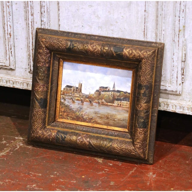 Decorate a shelf, study, or tabletop with this charming antique porcelain painting depicting the historic French city of...