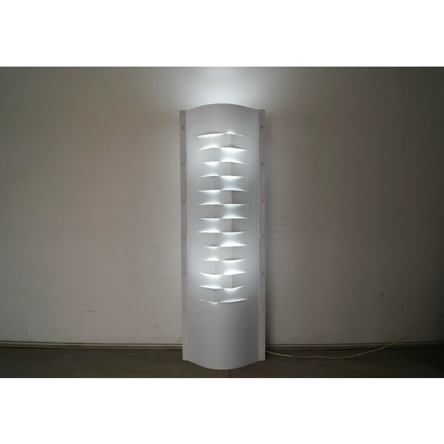 Vintage Post Modern floor lamp for sale. Designed and manufactured by SLAMP, and made in Italy. It's an original Post-...