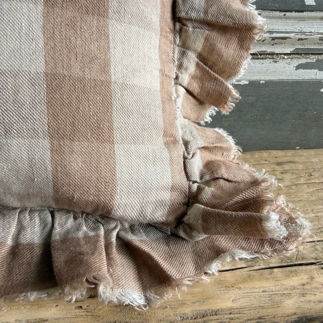 Made in France A timeless linen accent pillow with ruffle and tattered edges woven in France — The latest collection is a...