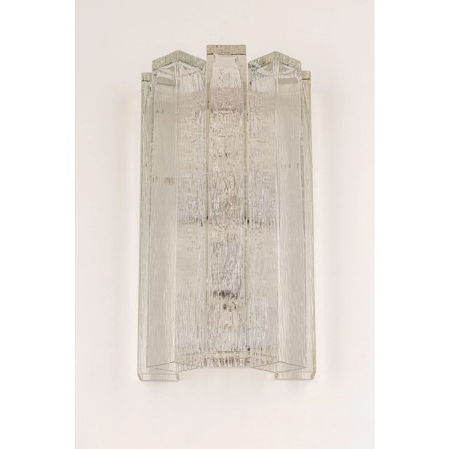 Wonderful pair of mid-century wall sconces with ice glass tubes, made by doria leuchten, germany, manufactured, circa...