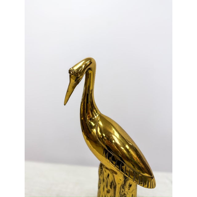 Elevate your home decor with this vintage brass crane figurine by Ethan Allen. Expertly crafted with a sleek finish, this...