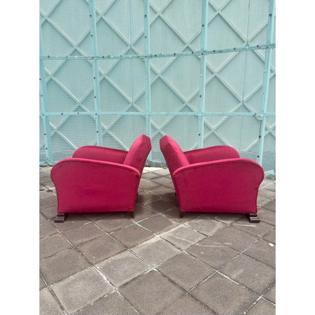 A striking pair of Scandinavian Art Deco lounge chairs dating to the 1930s or 1940s. These substantial and exceptionally...