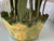Vintage metal container with metal tulips and leaves