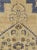 This Mid-20th century Turkish Oushak carpet presents a softly balanced composition centered by a stepped geometric...
