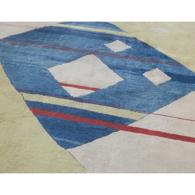Unique hand-knotted rug with a Bauhaus stylized geometrical design. The rug was one of two rugs contracted to be made by a...