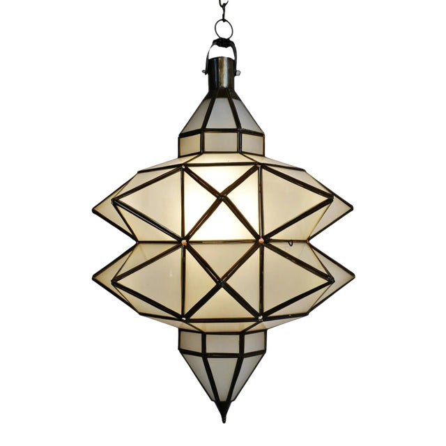 Beautiful vintage double prism frosted pendant lantern. Hand crafted metal trim with frosted glass triangle shapes form an...
