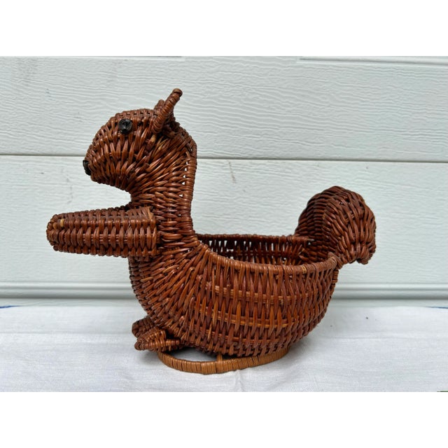 A friendly little squirrel basket! A fun accent for your bathroom or shelf- use it to hold hair ties, rolled washcloths,...