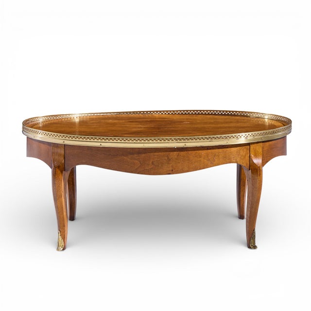 Baker Furniture French Louis XV Mahogany and Brass Coffee Table This coffee table measures: 40 wide x 28.5 deep x 17...