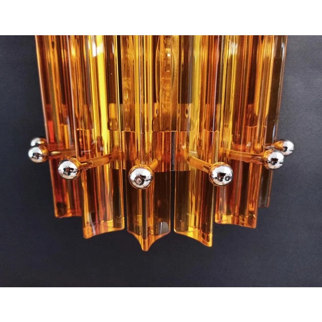 Trio vintage Murano wall sconce, amber triedri, column Mariangela model Fantastic Trio of vintage Murano wall sconce made...