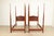 A gorgeous pair of Federal or Georgian style carved walnut twin size poster beds In the manner of Baker Furniture By...